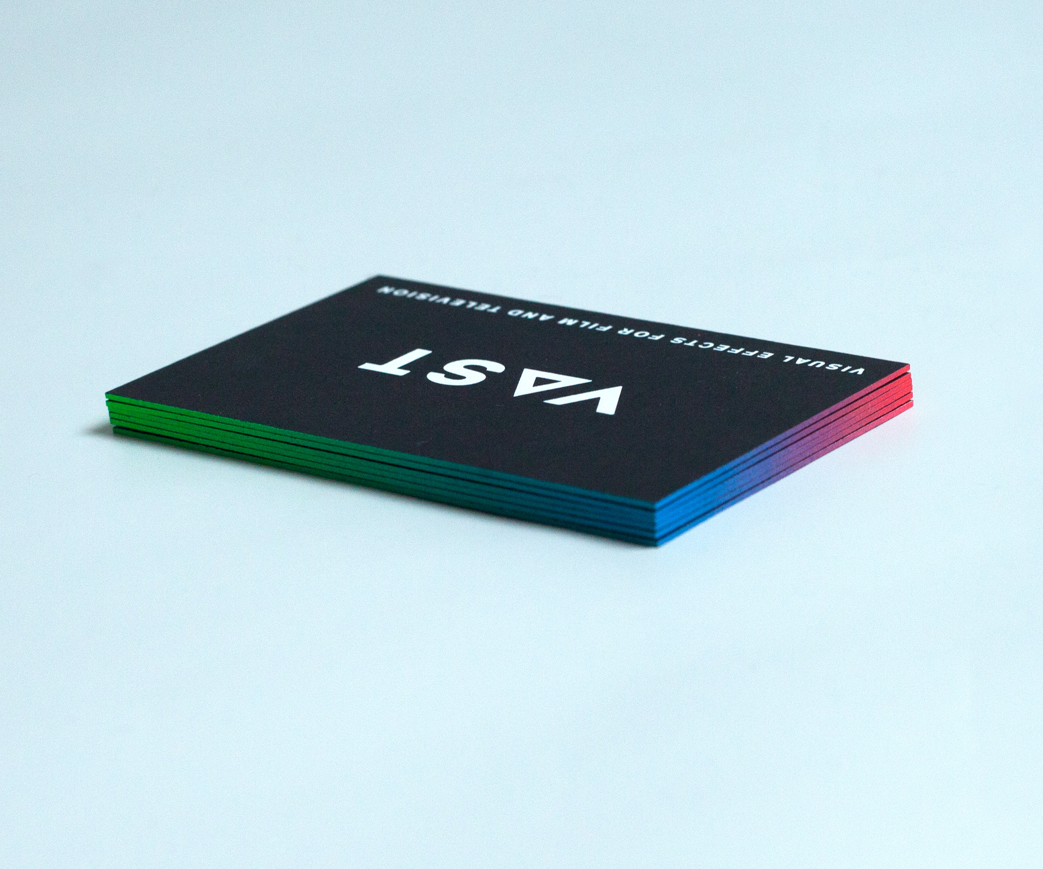 VAST business cards with colored egdes with a gradient